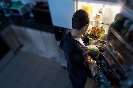 simsearch:700-00077881,k - Back View of Man Standing at Fridge, Having Chicken as Midnight Snack Stock Photo - Rights-Managed, Code: 700-00084261