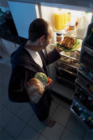 simsearch:700-00077881,k - Man Standing at Fridge, Having Chicken as Midnight Snack Stock Photo - Rights-Managed, Code: 700-00084262