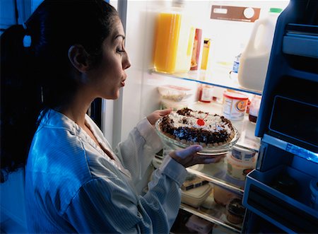 Woman Standing at Fridge, Having Pie as Midnight Snack Stock Photo - Rights-Managed, Code: 700-00084379