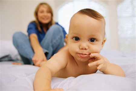 Portrait of Mother and Baby on Bed Stock Photo - Rights-Managed, Code: 700-00084517