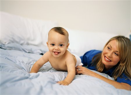 Mother and Baby on Bed Stock Photo - Rights-Managed, Code: 700-00084523