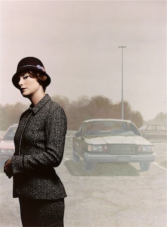 Portrait of Woman Wearing Hat And Jacket in Parking Lot Stock Photo - Rights-Managed, Code: 700-00084900