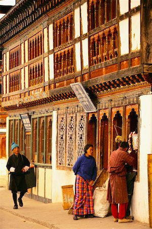 People Walking by Building Paro Valley, Bhutan Stock Photo - Rights-Managed, Code: 700-00085123