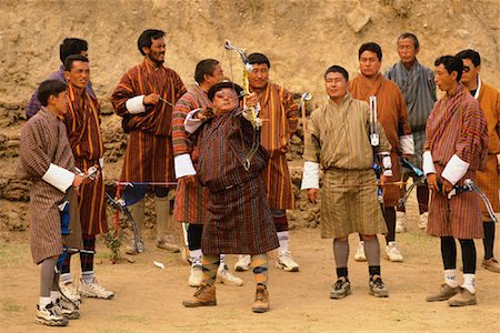 Men in Archery Competition at Gasello, Wangdue Phodrang Valley Bhutan Stock Photo - Rights-Managed, Code: 700-00085136