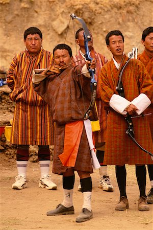 Men in Archery Competition at Gasello, Wangdue Phodrang Valley Bhutan Stock Photo - Rights-Managed, Code: 700-00085137