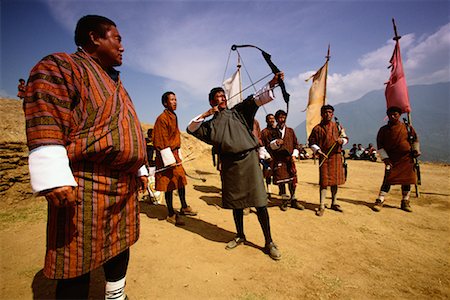 Men in Archery Competition at Gasello, Wangdue Phodrang Valley Bhutan Stock Photo - Rights-Managed, Code: 700-00085140