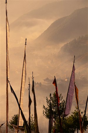 Prayer Flags, Landscape and Fog Thimpu Valley, Bhutan Stock Photo - Rights-Managed, Code: 700-00085170