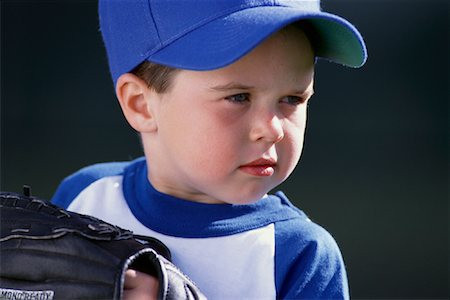 Boy Wearing Baseball Uniform and Glove Stock Photo - Rights-Managed, Code: 700-00085413