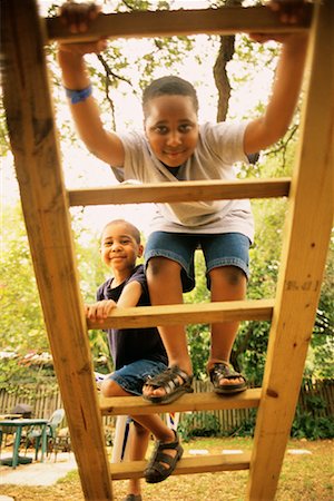 Two Boys Climbing Treehouse Ladder Stock Photo - Rights-Managed, Code: 700-00085429