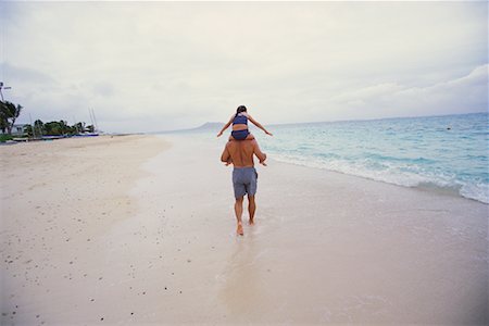 piggyback daughter at beach - Back View of Father and Daughter In Swimwear on Beach Stock Photo - Rights-Managed, Code: 700-00085605