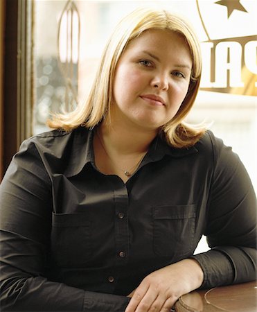 fat women sitting cafe tables - Portrait of Woman Sitting in Cafe Stock Photo - Rights-Managed, Code: 700-00085661