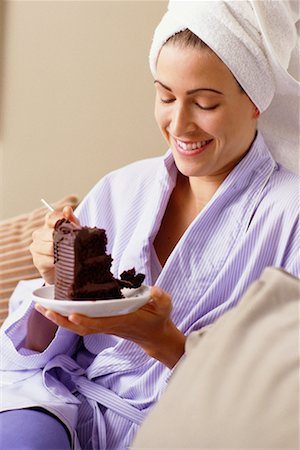 simsearch:700-00787004,k - Woman in Bathrobe, Eating Slice Of Chocolate Cake Stock Photo - Rights-Managed, Code: 700-00086018