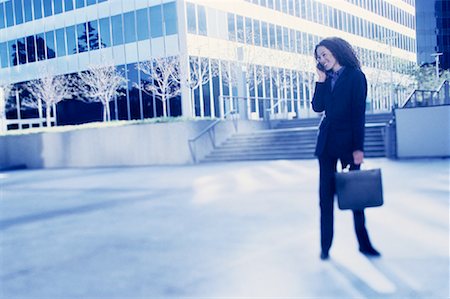 simsearch:700-00071171,k - Businesswoman Standing Outdoors Using Cell Phone Stock Photo - Rights-Managed, Code: 700-00086276