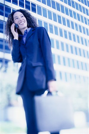 simsearch:700-00071171,k - Businesswoman Standing Outdoors Using Cell Phone Stock Photo - Rights-Managed, Code: 700-00086273