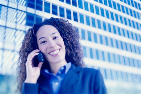 simsearch:700-00071171,k - Portrait of Businesswoman Using Cell Phone, Smiling Outdoors Stock Photo - Rights-Managed, Code: 700-00086335