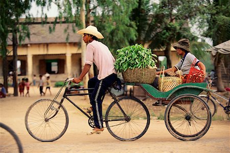 simsearch:700-00554819,k - Man and Woman on Bike with Basket Of Vegetables from Market Siem Reap, Cambodia Stock Photo - Rights-Managed, Code: 700-00086634