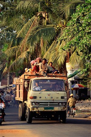Truckload of People on Road Phnom Penh, Cambodia Stock Photo - Rights-Managed, Code: 700-00086630