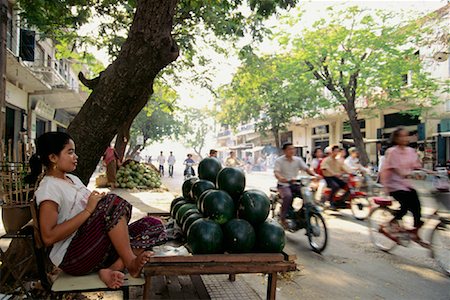 Woman with Shop by Road Phnom Penh, Cambodia Stock Photo - Rights-Managed, Code: 700-00086666
