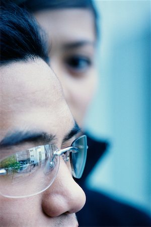 Close-up of a teenage boy wearing sunglasses - Stock Photo