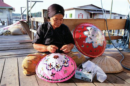 simsearch:700-00080150,k - Woman Making Food Covers Outdoors Kampong Ayer, Bandar Seri Begawan Brunei Darussalam Stock Photo - Rights-Managed, Code: 700-00086945