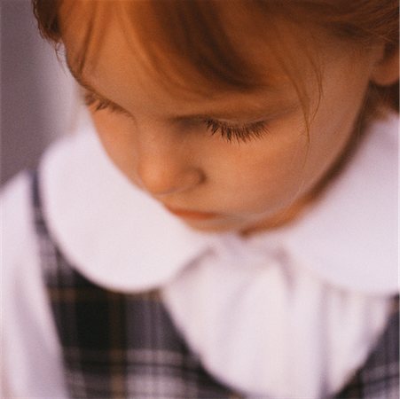 sad kids school uniform - Girl Looking Down Stock Photo - Rights-Managed, Code: 700-00087007