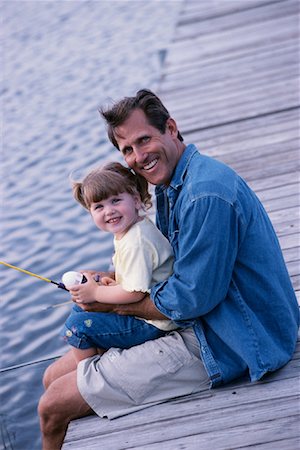 father daughter fishing not woman - Father and Daughter with Fishing Rod on Dock Stock Photo - Rights-Managed, Code: 700-00087374