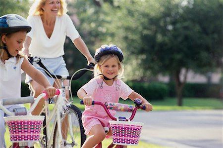 simsearch:700-00054695,k - Family Riding Bikes Stock Photo - Rights-Managed, Code: 700-00087810