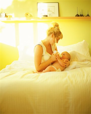 Mother and Baby on Bed Stock Photo - Rights-Managed, Code: 700-00087915