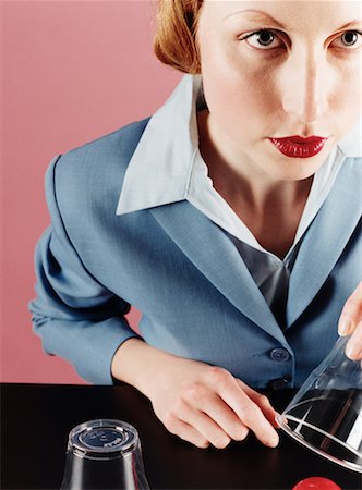 Businesswoman with Cups and Ball Stock Photo - Rights-Managed, Code: 700-00088084