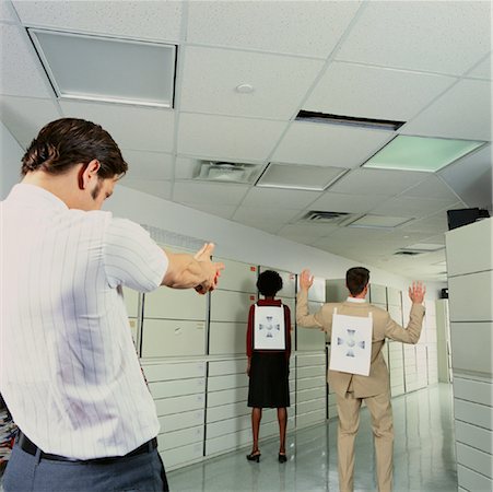 Businessmen and Businesswoman in Office with Targets Stock Photo - Rights-Managed, Code: 700-00088909