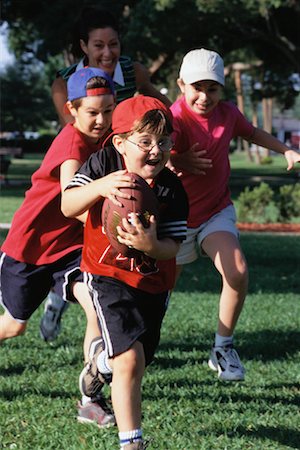 simsearch:700-00181648,k - Children Playing Football Stock Photo - Rights-Managed, Code: 700-00089222