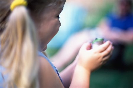 Girl Holding Frog Stock Photo - Rights-Managed, Code: 700-00089524