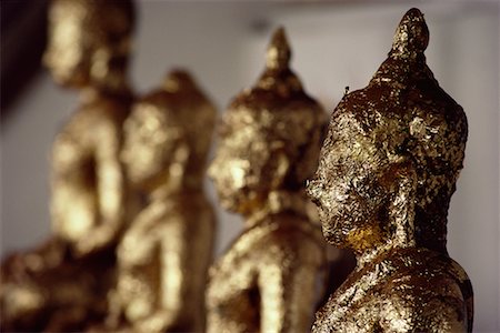 Buddha Statues Covered in Gold Leaf, Bangkok, Thailand Stock Photo - Rights-Managed, Code: 700-00080044