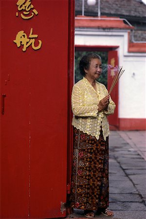 smelling old people - Mature Woman Holding Joss Sticks At Cheng Hoon Teng Temple Malacca, Malaysia Stock Photo - Rights-Managed, Code: 700-00080074