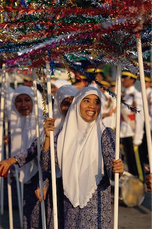 simsearch:700-00080150,k - Woman Holding Bunga Manggar at Annual Independence Day Celebration, Malaysia Stock Photo - Rights-Managed, Code: 700-00080115