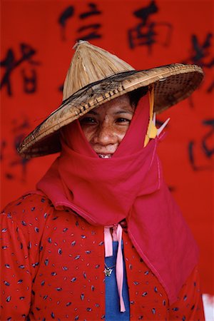 Portrait of Woman Wearing Hat And Scarf near Ma Tsu Temple Near Tainan, Taiwan Stock Photo - Rights-Managed, Code: 700-00080190