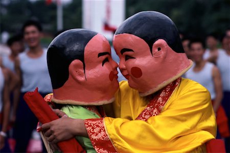 Performers Wearing Masks Embracing Outdoors Taiwan Stock Photo - Rights-Managed, Code: 700-00080224