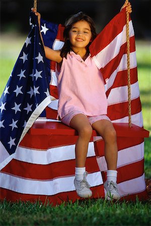 Portrait of Girl on Swing With American Flag Stock Photo - Rights-Managed, Code: 700-00080251