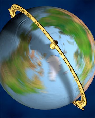 simsearch:700-00035619,k - Overhead View of Globe Spinning On Stand Stock Photo - Rights-Managed, Code: 700-00080708