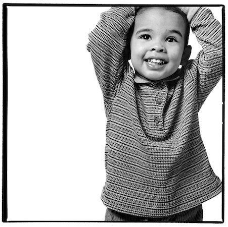 Portrait of Boy with Arms Raised Stock Photo - Rights-Managed, Code: 700-00080700