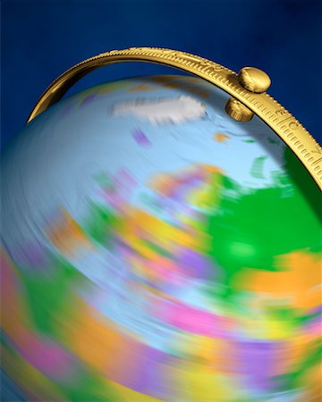 simsearch:700-00080718,k - Blurred View of Globe Spinning On Stand Europe Foto de stock - Direito Controlado, Número: 700-00080718