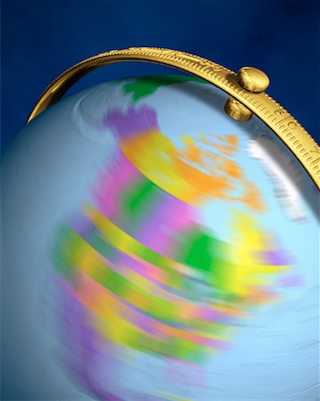 free trade - Blurred View of Globe Spinning On Stand North America Fotografie stock - Rights-Managed, Codice: 700-00080719