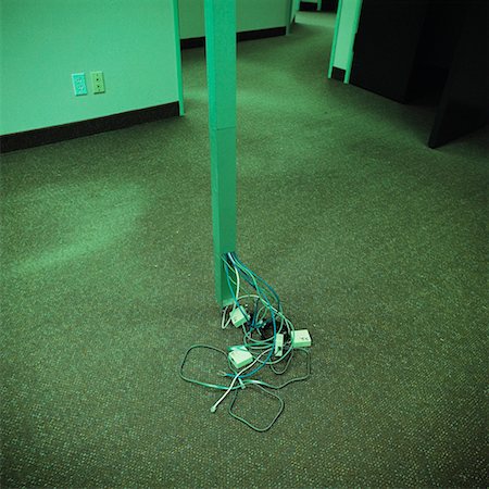 plug mess - Wires from Pole in Empty Office Stock Photo - Rights-Managed, Code: 700-00080773