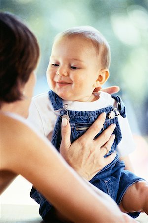Mother Holding Baby, Face to Face Stock Photo - Rights-Managed, Code: 700-00080950