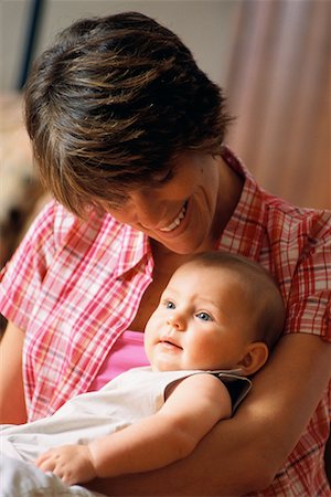 simsearch:700-00074987,k - Mother Holding Baby on Lap Stock Photo - Rights-Managed, Code: 700-00080997