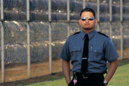 prison guards in uniform - Portrait of Male Prison Guard Outdoors, Michigan State Penitentiary, Michigan, USA Stock Photo - Rights-Managed, Code: 700-00081109