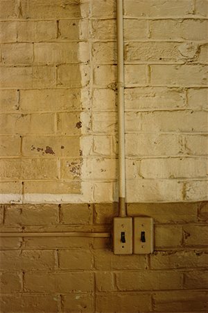 simsearch:600-00065203,k - Close-Up of Brick Wall with Light Switches Stock Photo - Rights-Managed, Code: 700-00081143
