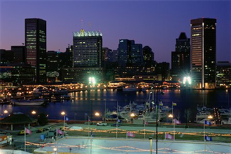 pictures of baltimore city lights - City Skyline and Ice Skating Rink At Dusk Baltimore, Maryland, USA Stock Photo - Rights-Managed, Code: 700-00081238