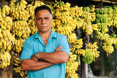 fruit merchant - Portrait of Mature Male Banana Vendor with Arms Crossed Stock Photo - Rights-Managed, Code: 700-00082063