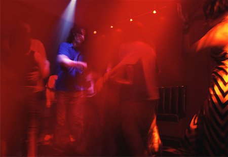 Blurred View of People Dancing In Club Stock Photo - Rights-Managed, Code: 700-00082335